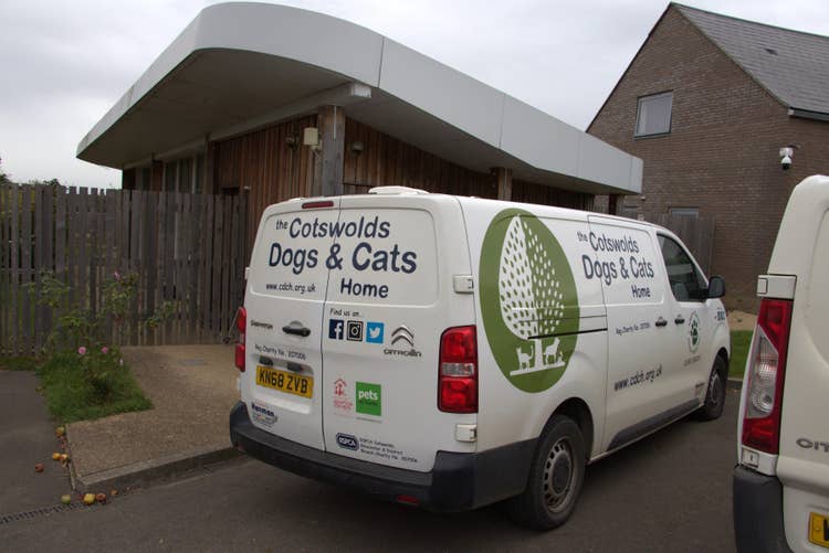 A wide shot of the Cotswold Dogs and Cat Home van parked outside their centre in Gloucestershire