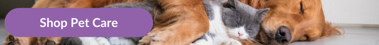 A grey and white domestic shorthair cat sleeping curled up with a sleeping golden retriever with overlay text that reads: &#34;Shop Pet Care&#34;