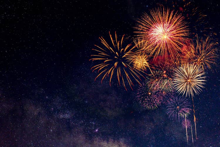 Red and gold fireworks lighting up the night sky